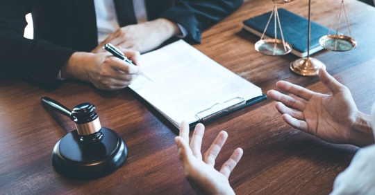 confused client consulting with a lawyer