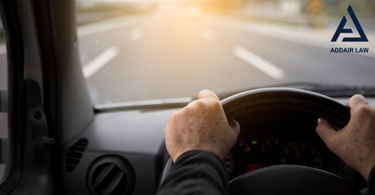 Driving with both hands on the steering wheel