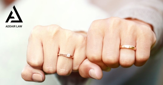 couple showing off their rings